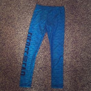 Blue leggings, on the side say fierce and fab